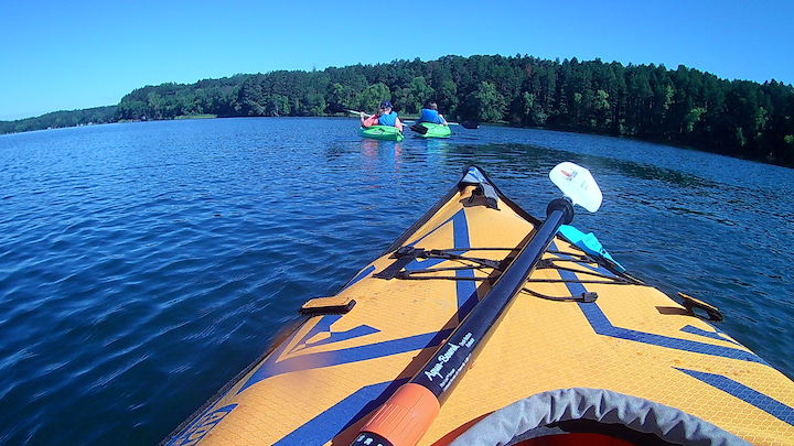 kayakers on a lake