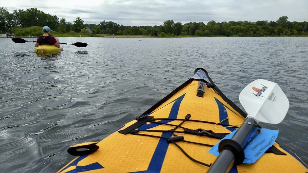 kayakers and a loon on big marine lake