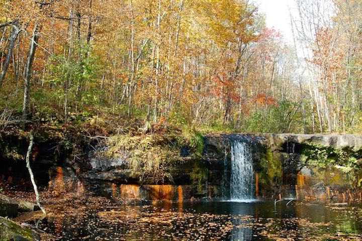 wolf creek falls at banning state park in the fall
