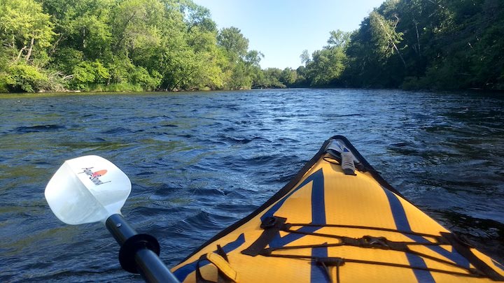 kayaking the rum river on a summer day