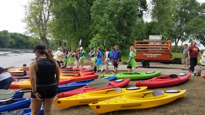 Twin Cities Kayaking with kayaks on the beach