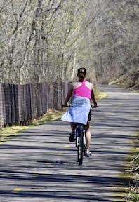 woman biking in spring