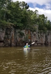 kayaker on st croix river summer