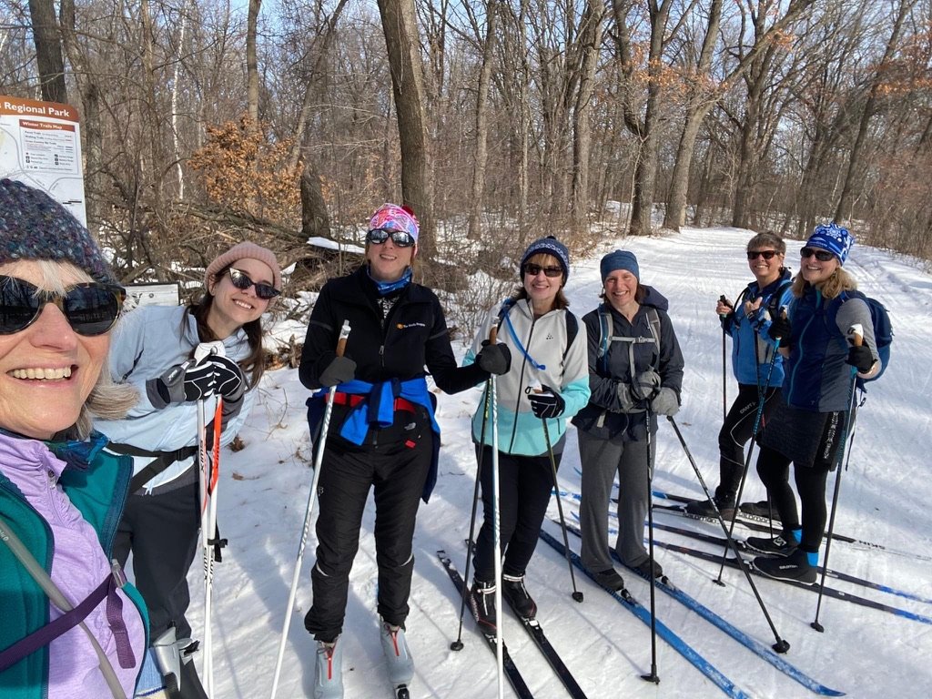 Over the Hill Outdoors ski class with a group of women
