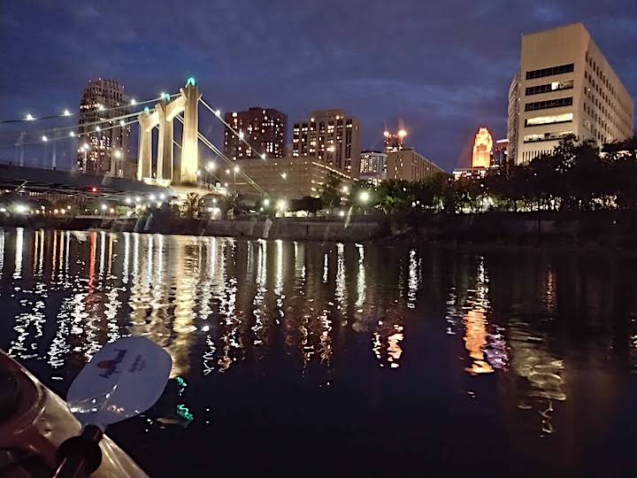 kayaker's view of Minneapolis skyline at night