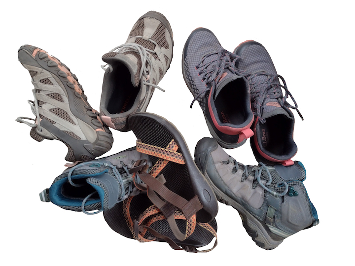 four different types of shoes for hiking
