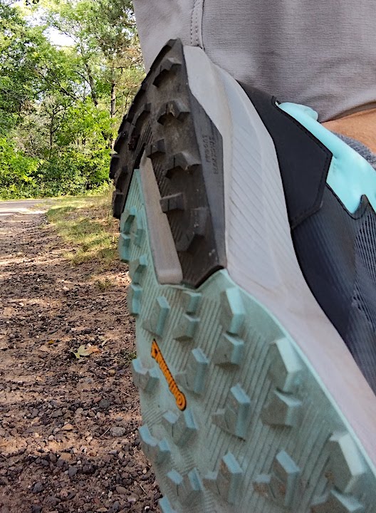 showing the tread on trail running shoes